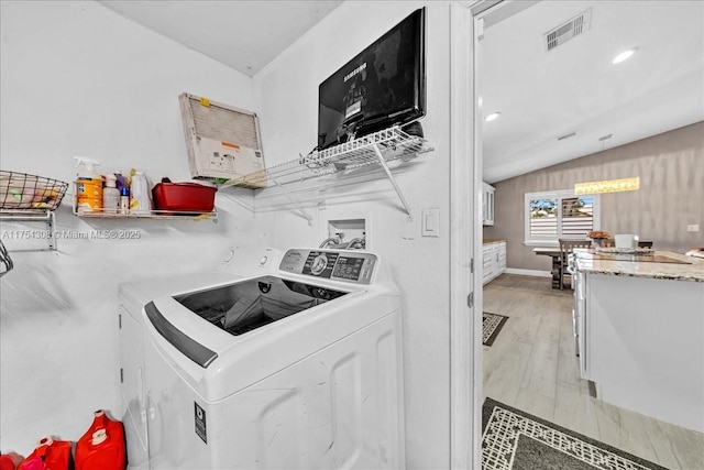 laundry room with laundry area, visible vents, washer and clothes dryer, light wood-style floors, and recessed lighting