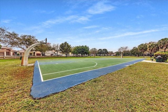 view of sport court with community basketball court and a lawn