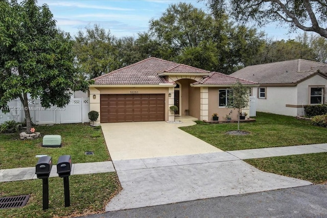 single story home featuring a garage, driveway, a tiled roof, a front lawn, and stucco siding