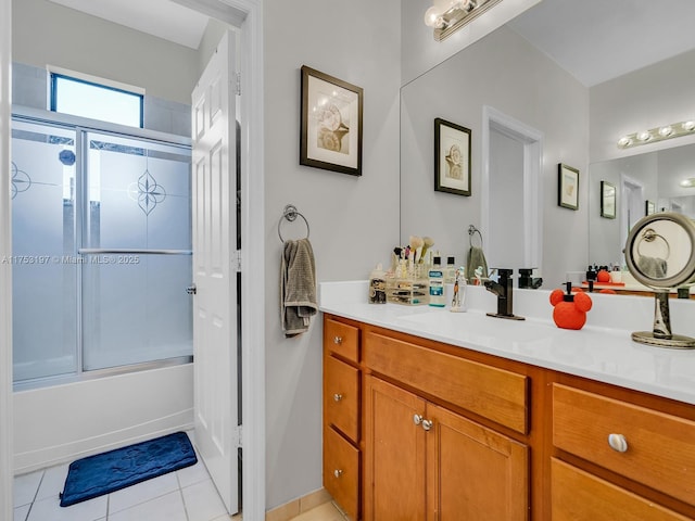 full bathroom with vanity, combined bath / shower with glass door, and tile patterned floors