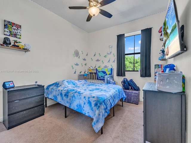 carpeted bedroom with a ceiling fan