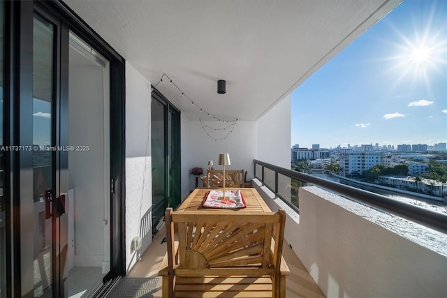 balcony featuring a view of city