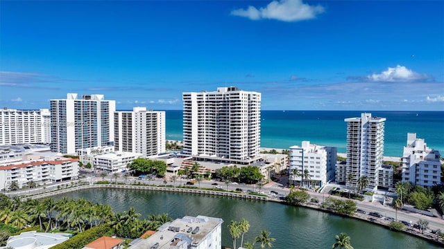 bird's eye view with a water view and a city view