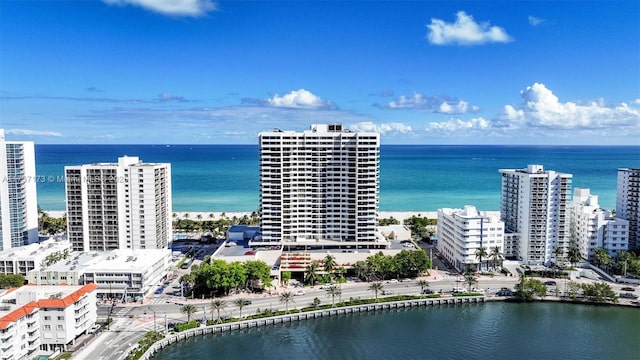 bird's eye view with a water view and a view of city