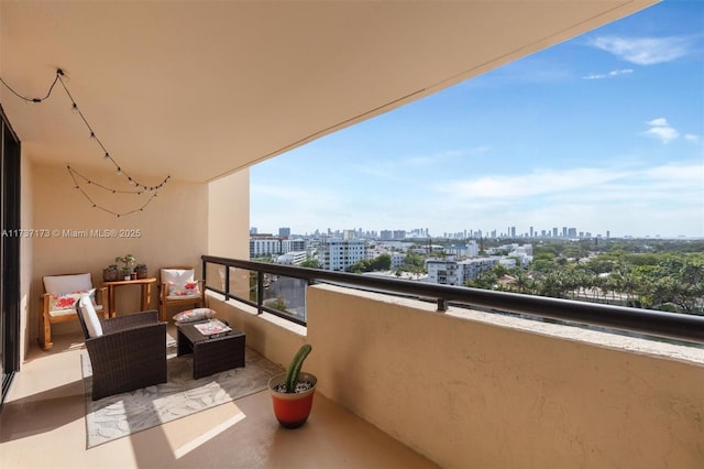 balcony featuring a city view