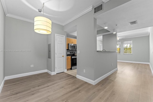 interior space with ornamental molding, light wood-type flooring, and visible vents