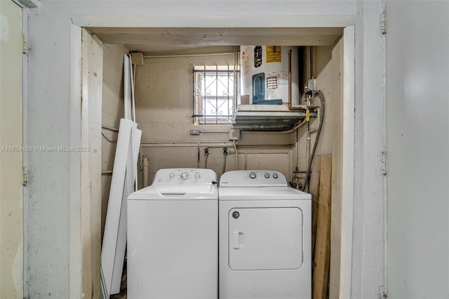 washroom featuring laundry area and separate washer and dryer