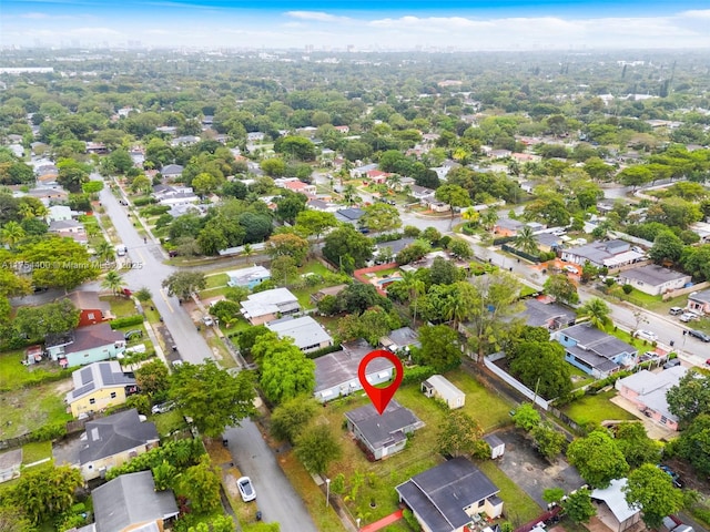 birds eye view of property with a residential view