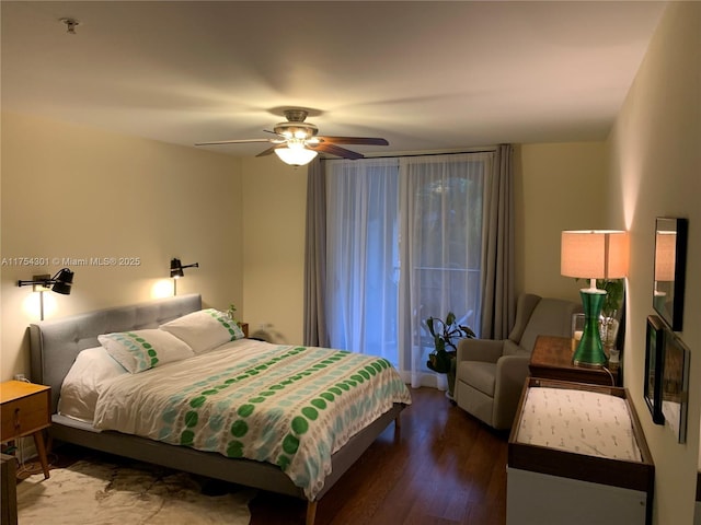 bedroom with a ceiling fan and wood finished floors