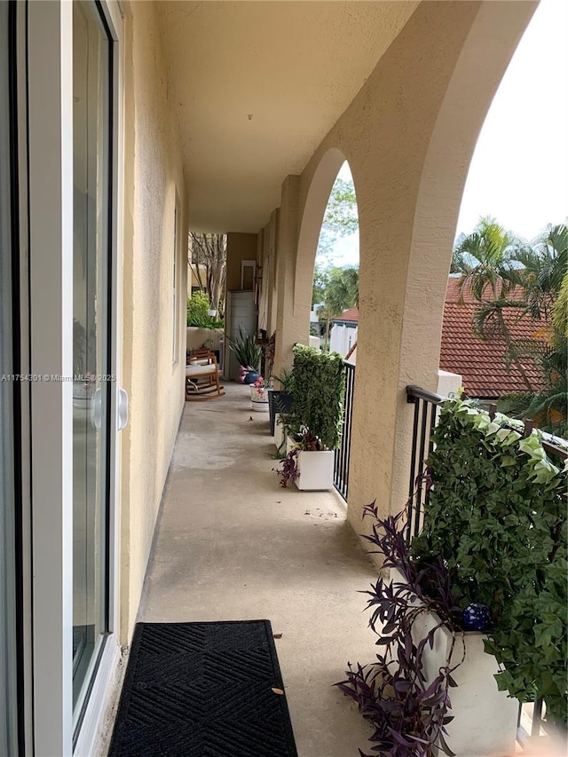 view of patio with a balcony