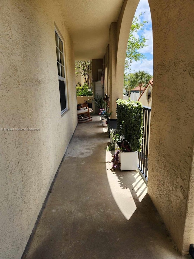 view of patio with a balcony