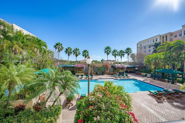 community pool featuring a patio area