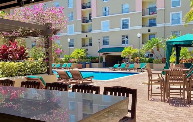 pool with a patio area