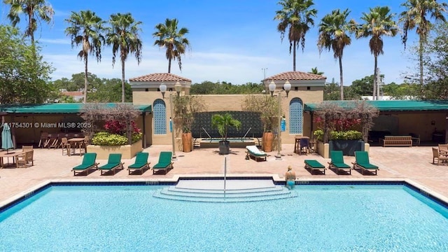 pool with a patio