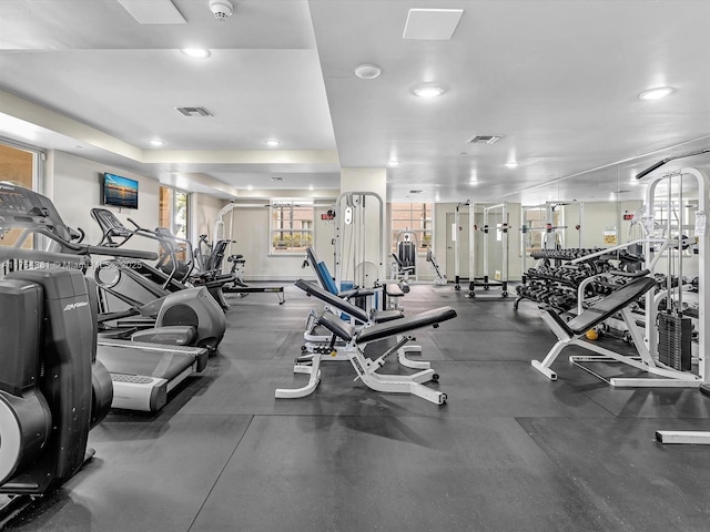 workout area featuring visible vents and recessed lighting