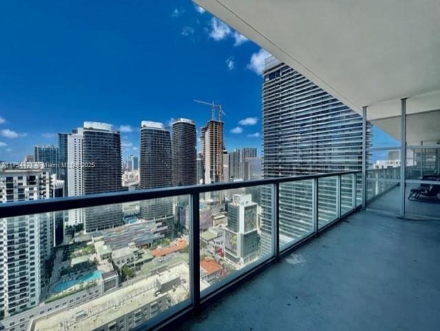 balcony featuring a city view