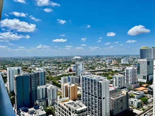 birds eye view of property featuring a view of city