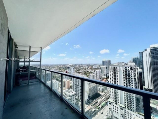 balcony featuring a view of city