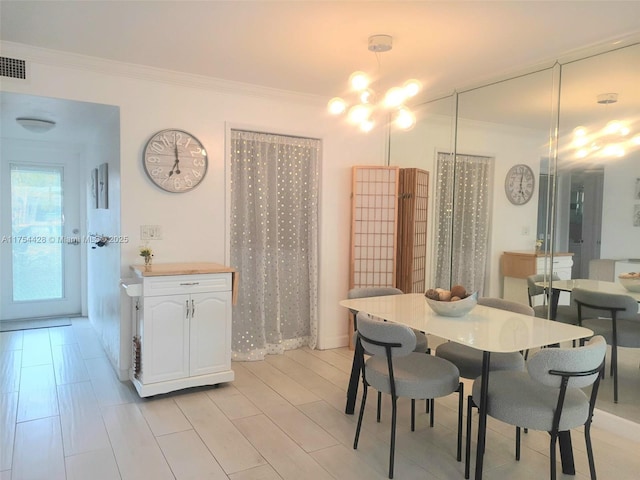 2600 Diana Dr Unit 103, Hallandale Beach, FL 33009 - dining area with ornamental molding