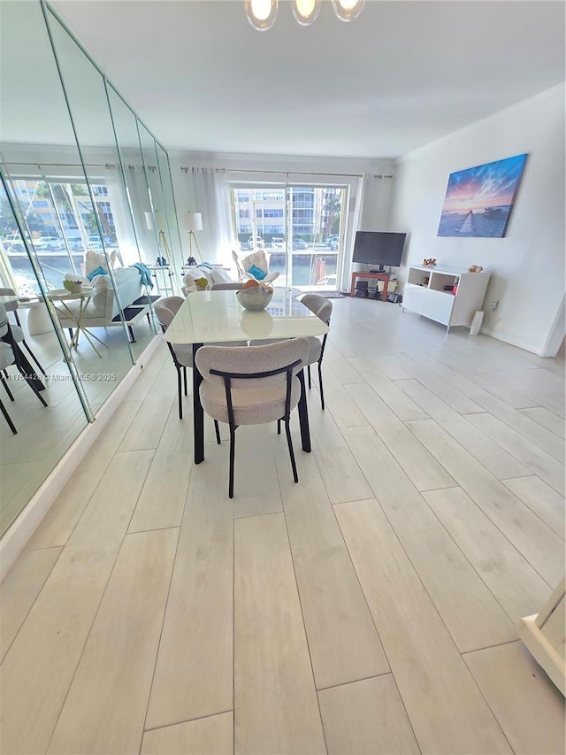 2600 Diana Dr Unit 103, Hallandale Beach, FL 33009 - dining space with light wood-type flooring