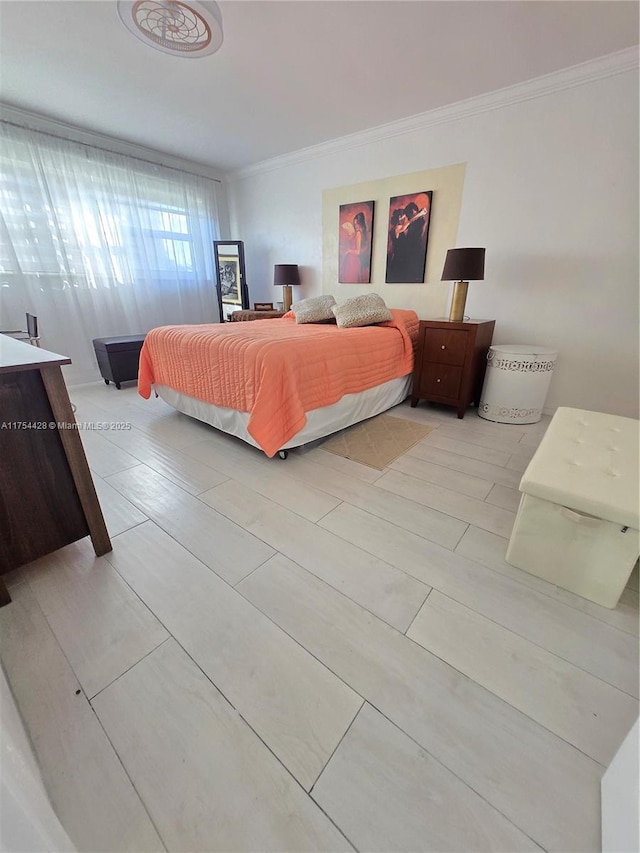 bedroom featuring ornamental molding