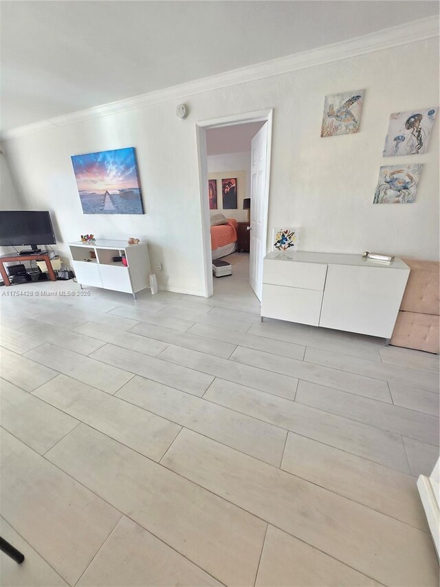 2600 Diana Dr Unit 103, Hallandale Beach, FL 33009 - living room with crown molding