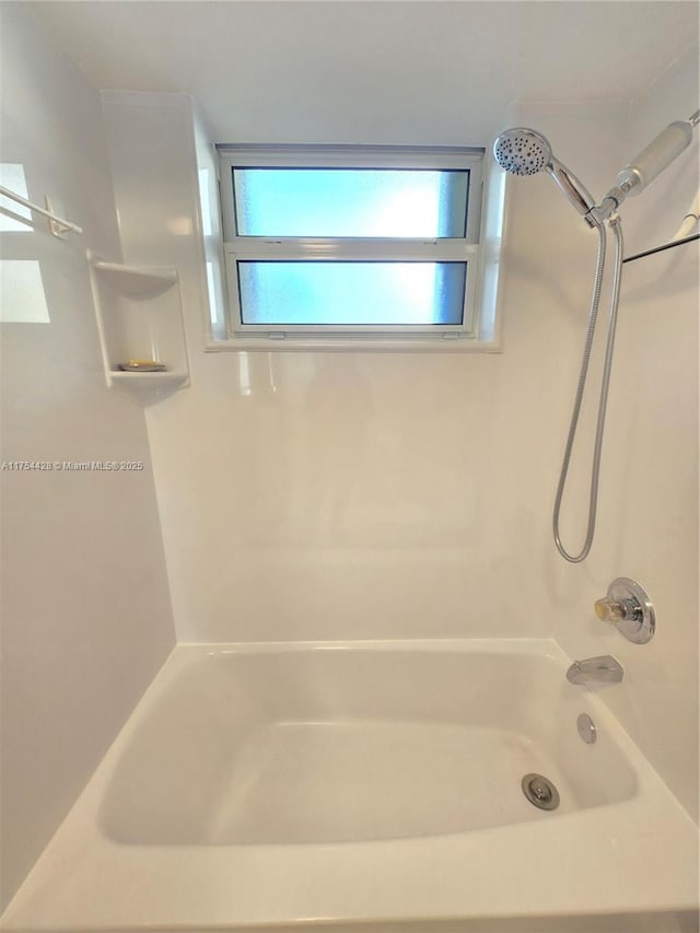 2600 Diana Dr Unit 103, Hallandale Beach, FL 33009 - full bathroom featuring washtub / shower combination