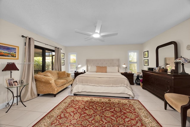 bedroom featuring ceiling fan and light tile patterned floors