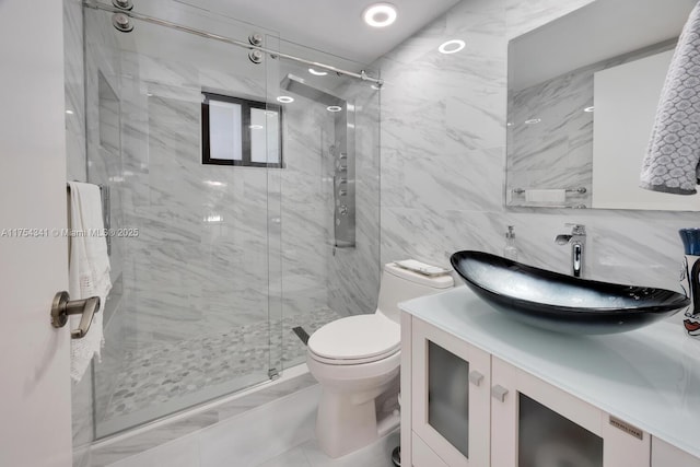 full bathroom featuring a marble finish shower, decorative backsplash, toilet, vanity, and tile walls