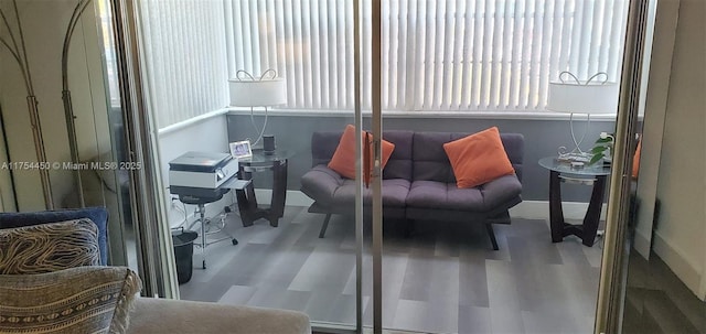 3160 Holiday Springs Blvd Unit 7-112, Margate, FL 33063 - sitting room with wood finished floors