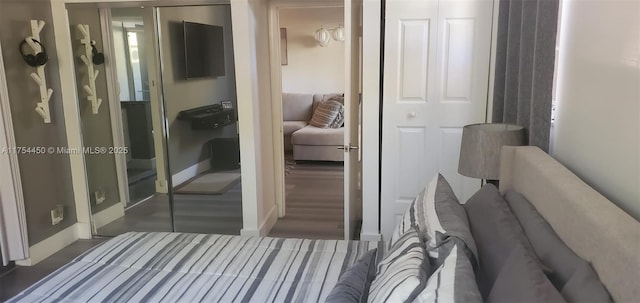 3160 Holiday Springs Blvd Unit 7-112, Margate, FL 33063 - bedroom featuring baseboards