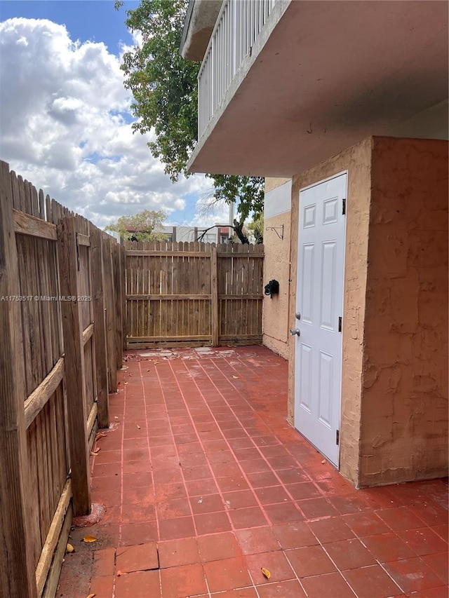 300 NW 107th Ave Unit 106, Miami, FL 33172 - view of patio / terrace featuring fence
