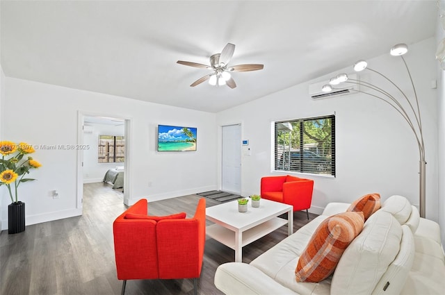 living room featuring lofted ceiling, a healthy amount of sunlight, a wall mounted air conditioner, and wood finished floors