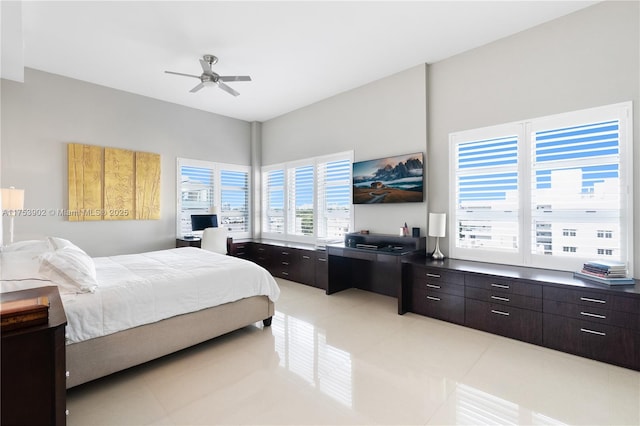 bedroom featuring ceiling fan and light tile patterned floors