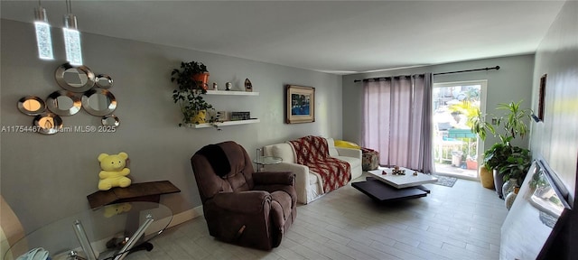 sitting room with wood finished floors