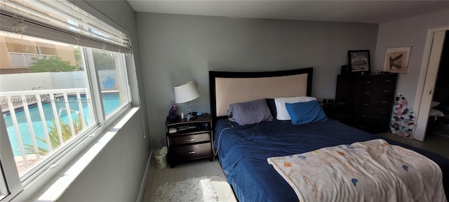 bedroom with wood finished floors