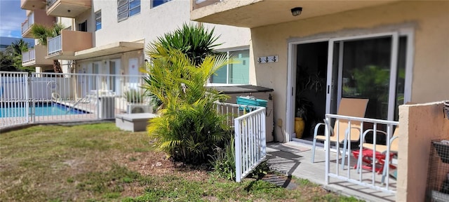 exterior space featuring fence and a fenced in pool