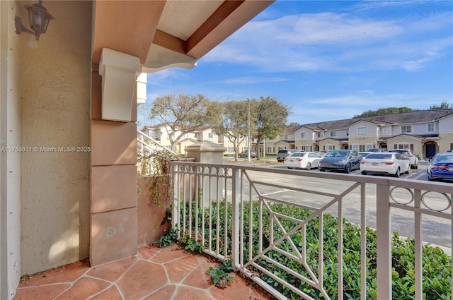 balcony featuring a residential view