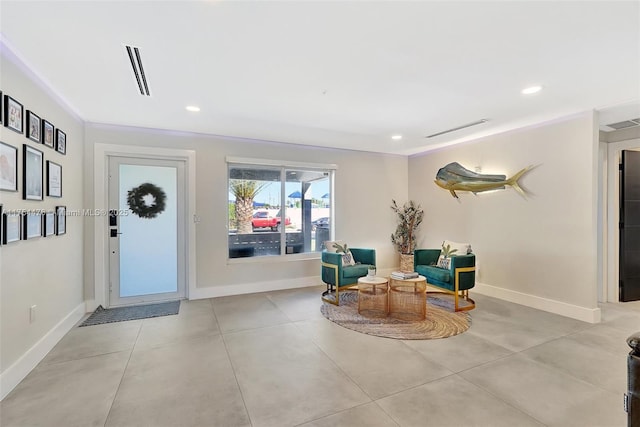 foyer featuring recessed lighting, visible vents, and baseboards