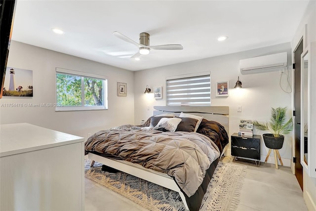 bedroom with ceiling fan, a wall mounted air conditioner, and recessed lighting