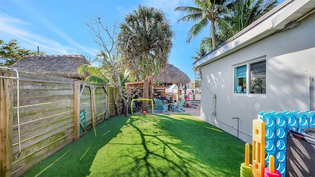 view of yard with a patio area, a fenced backyard, and a gazebo