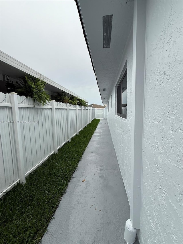 view of home's exterior featuring a fenced backyard and stucco siding