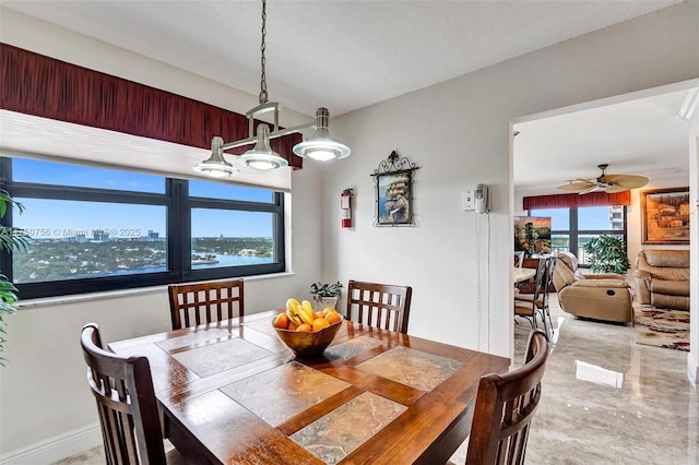 1201 S Ocean Dr Unit 1711S, Hollywood, FL 33019 - dining room with marble finish floor, ceiling fan, and baseboards