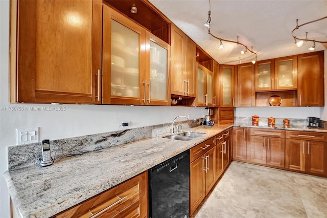 1201 S Ocean Dr Unit 1711S, Hollywood, FL 33019 - kitchen featuring black dishwasher, light stone counters, brown cabinetry, and a sink
