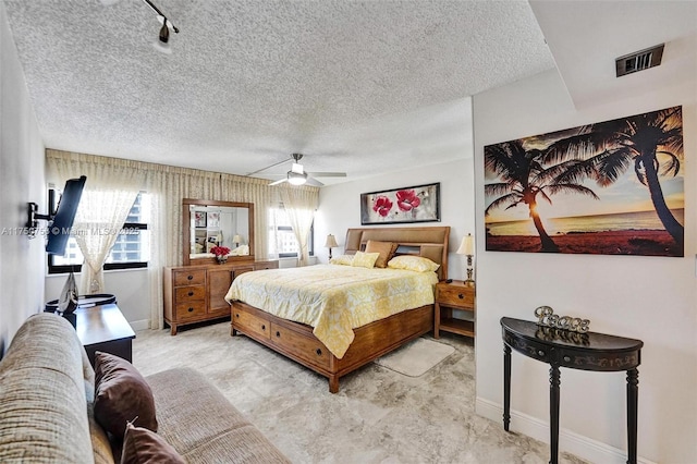 1201 S Ocean Dr Unit 1711S, Hollywood, FL 33019 - carpeted bedroom featuring a ceiling fan, visible vents, a textured ceiling, and baseboards