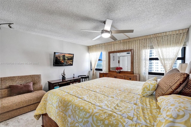 1201 S Ocean Dr Unit 1711S, Hollywood, FL 33019 - bedroom with a textured ceiling and ceiling fan