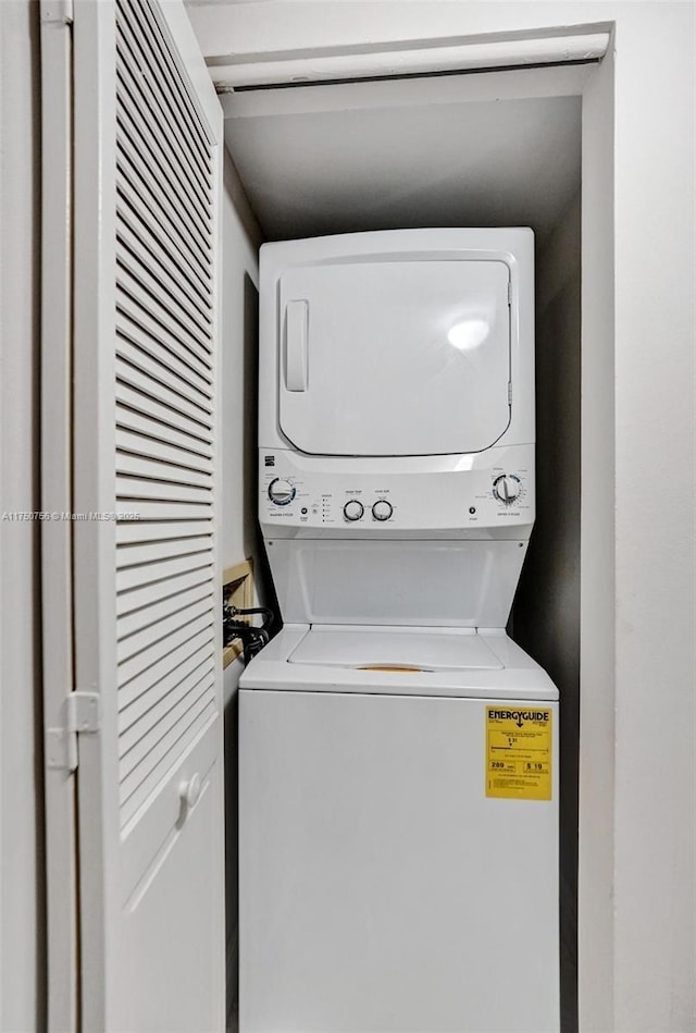 1201 S Ocean Dr Unit 1711S, Hollywood, FL 33019 - laundry room with laundry area and stacked washing maching and dryer