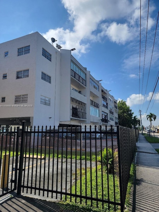 view of property featuring fence