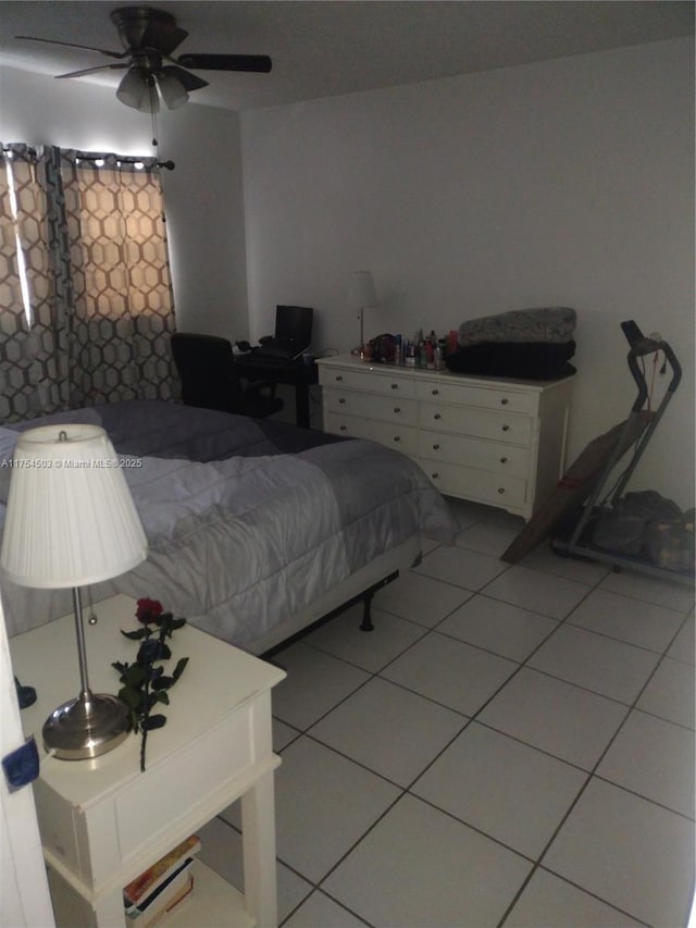 bedroom with light tile patterned floors