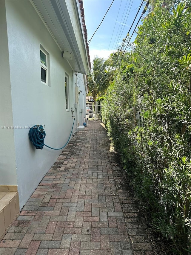 view of home's exterior with stucco siding